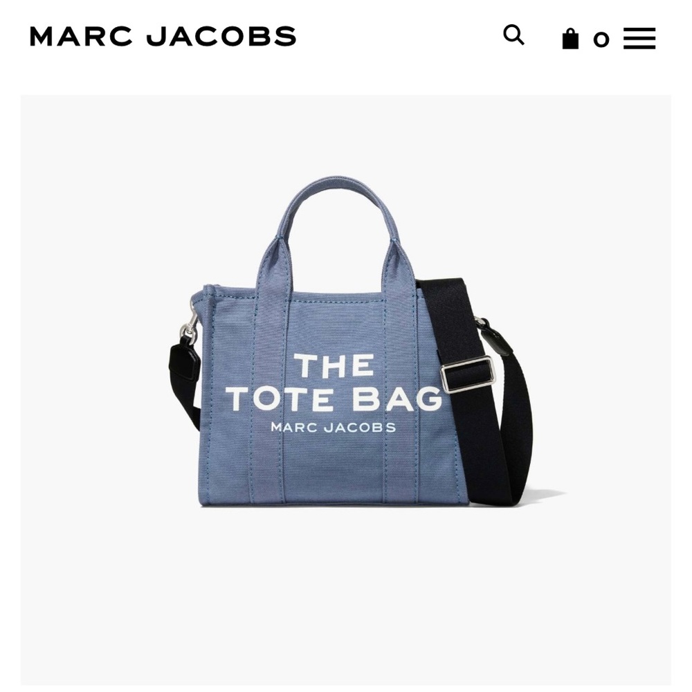 Cute Marc Jacobs mini canvas tote with adjustable crossbody strap.